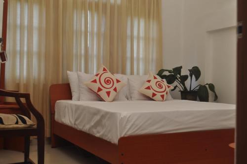 Katil atau katil-katil dalam bilik di Ceylon Valley Villa