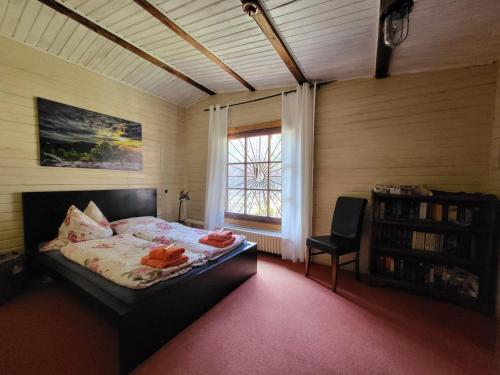 Postel nebo postele na pokoji v ubytování Ferienwohnung-Eldorstal-2-Urlaub-mit-Hund-in-Bad-Harzburg