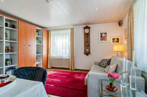 a living room with a couch and a table at Fewo Wegen in Salem