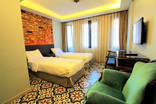 A bed or beds in a room at A Plus Residence