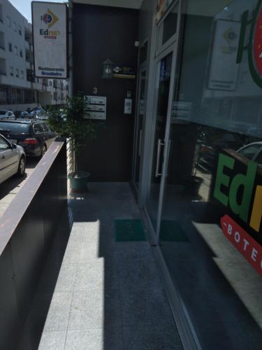 a store front with the entrance to a store at APART 2 Alojamento Para Turismo e Negócios in Braga