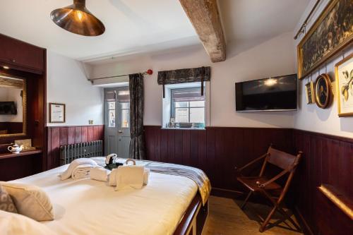 Cama ou camas em um quarto em 1777. At The Albion