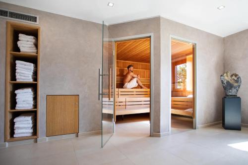 Postel nebo postele na pokoji v ubytování Gut Heckenhof Hotel & Golfresort an der Sieg GmbH & Co. KG