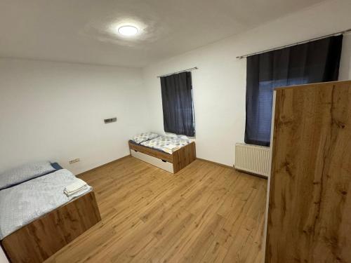 Postel nebo postele na pokoji v ubytování Albins Apartments