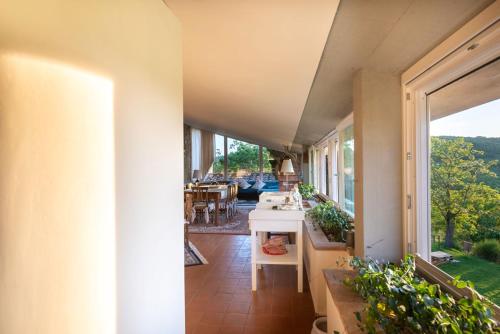 an internal view of a house with a balcony at La Vittoria 10 – La Soglia della Val d’Orcia in Chianciano Terme