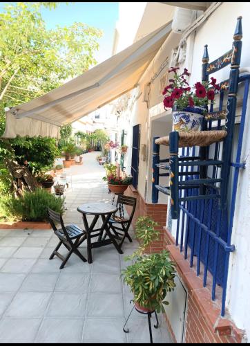 Típico y pintoresco patio de vecinos, con encanto