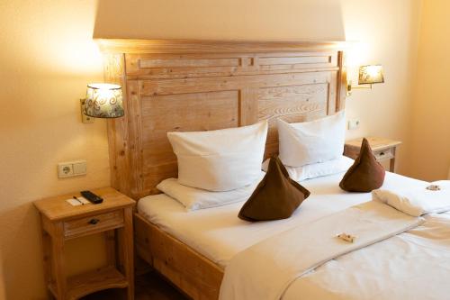 Postel nebo postele na pokoji v ubytování Hotel Kübler