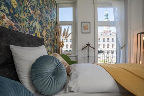 Postel nebo postele na pokoji v ubytování V62 studio apartments- Downtown Sopron