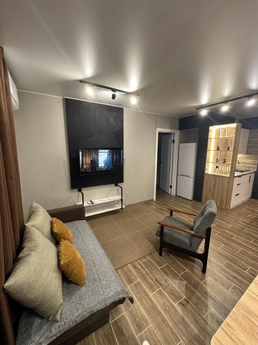 TV a/nebo společenská místnost v ubytování Loft apartment