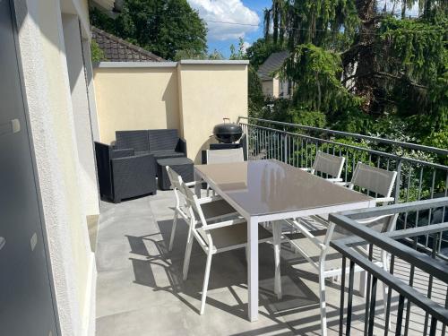 Photo de la galerie de l'établissement Maison avec terrasse, à Palaiseau
