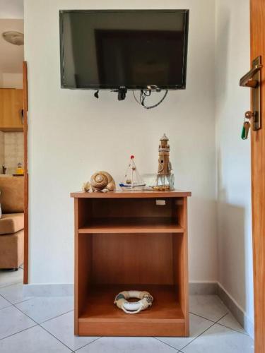 Televisyen dan/atau pusat hiburan di Apartments Manuel