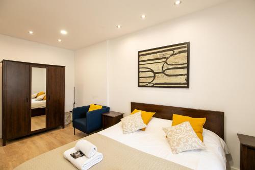 Кровать или кровати в номере Beautiful apartment with terrace in Barcelona