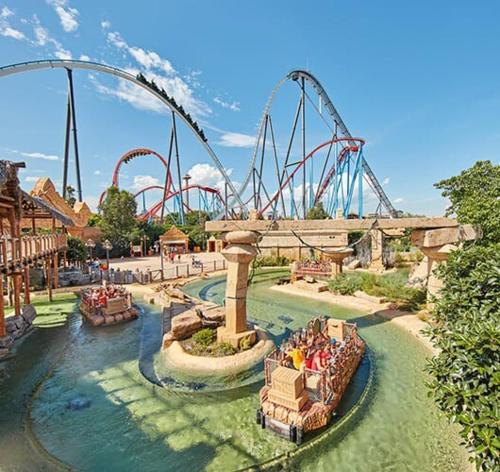 a water park with a roller coaster and a ride at Palm Beach by Unik Vacation in La Pineda