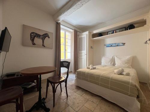 Cama o camas de una habitación en Maison Saint-Tropez