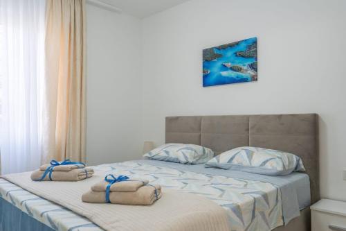 Ένα ή περισσότερα κρεβάτια σε δωμάτιο στο Apartman Helena