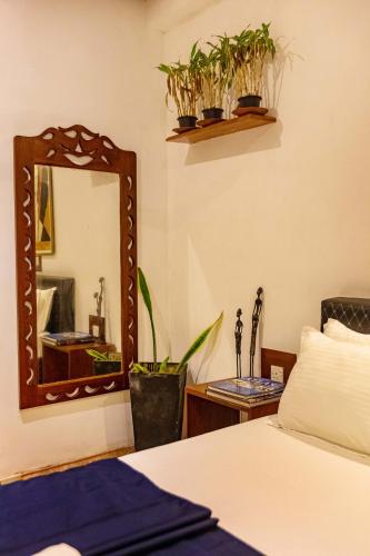 Llit o llits en una habitació de Villa Surf Beach