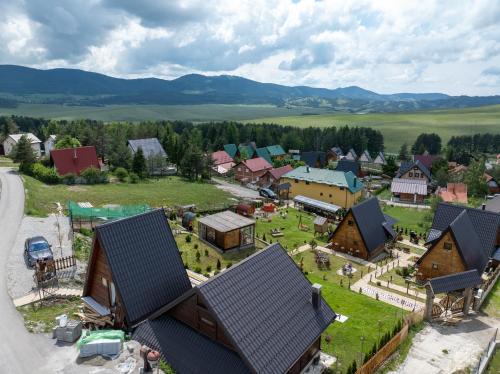 an aerial view of a small village with houses at Vila Deniri in Zlatibor