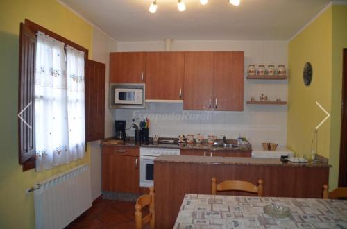 Kuchyň nebo kuchyňský kout v ubytování CA La Llosa Villahormes