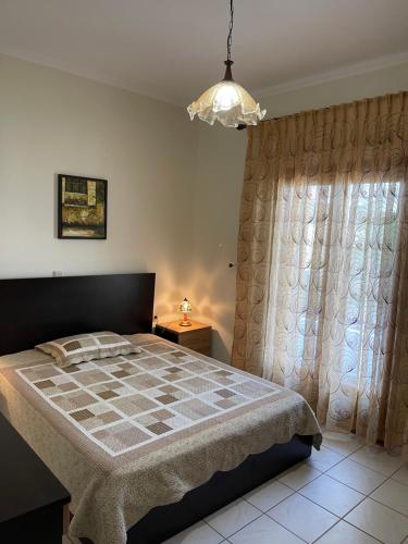 Postel nebo postele na pokoji v ubytování AURA Apartment