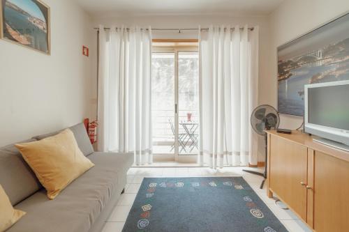 Downtown Trindade Apartment With Terrace by Vacationy