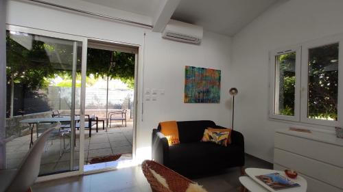 Χώρος καθιστικού στο La maison de Marie Hélène 2 piscine partagée