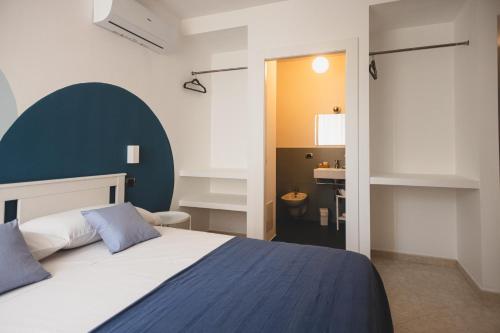 Postel nebo postele na pokoji v ubytování Piazza Verdi B&B