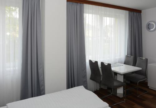 Postel nebo postele na pokoji v ubytování Apartmány - Frymburk My Family