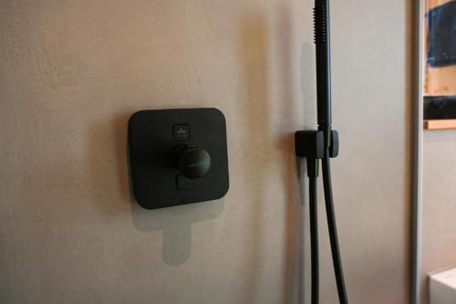 a computer mouse on a wall with a mouse pad at Tiny House Nature 14 - Green Tiny Village Harz in Osterode