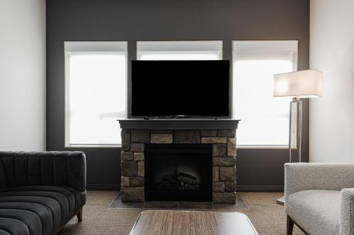 TV a/nebo společenská místnost v ubytování Premier Residence - Fort McMurray