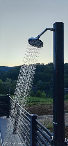 a water fountain hooked up to a light pole at UNA RESORT in Bosanska Krupa