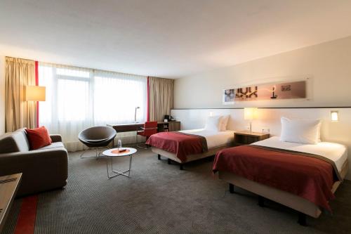 Postel nebo postele na pokoji v ubytování Holiday Inn Eindhoven Centre by IHG