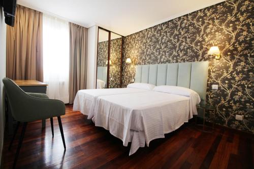 Hostería de Adarzo auto check