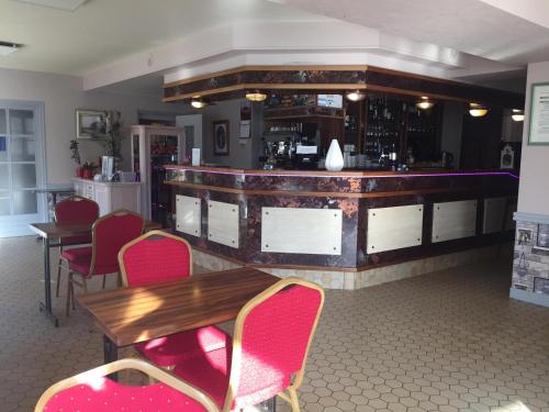 Ο χώρος του lounge ή του μπαρ στο Auberge du Calvaire