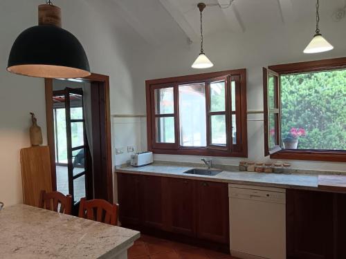Kuchyň nebo kuchyňský kout v ubytování Villa Claudine