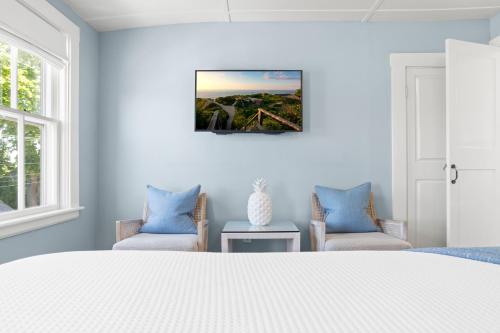 Giường trong phòng chung tại Carlisle House Inn