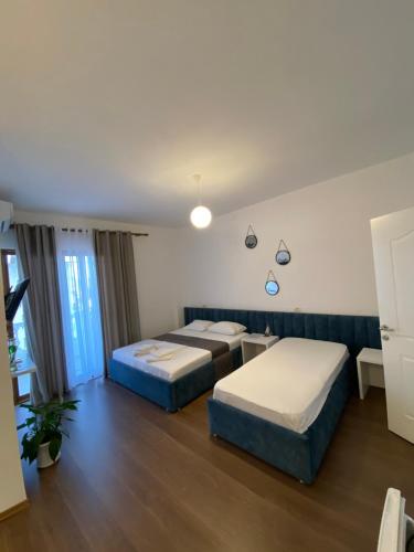 Una cama o camas en una habitación de Enia's Room