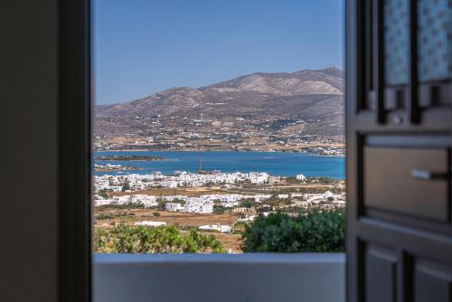 a view of a city from a window at Lagadia Village in Andiparos