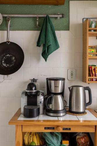 Kuchyň nebo kuchyňský kout v ubytování Chez Zany Boutique Hostel - Santa Teresa