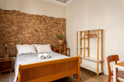 Postel nebo postele na pokoji v ubytování Chez Zany Boutique Hostel - Santa Teresa
