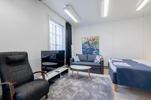 Posezení v ubytování Tyylikäs City studio, Terassi ja ilmainen parkki Vanha Postitalo