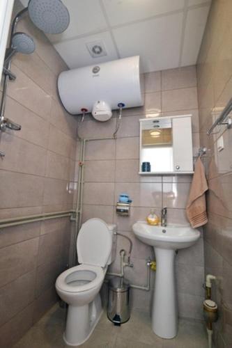 Koupelna v ubytování Apartment Bonada