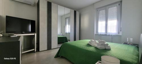 Ένα ή περισσότερα κρεβάτια σε δωμάτιο στο Intero Appartamento con Parcheggio Gratuito