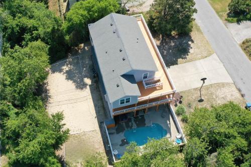 an overhead view of a house with a swimming pool at Follow the Sun in Duck