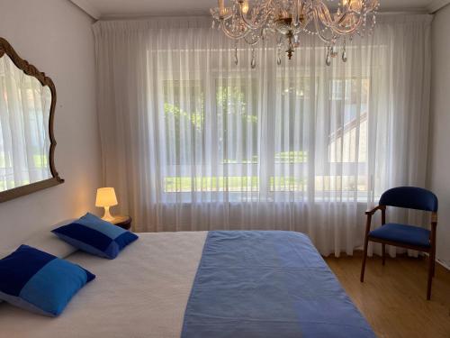 Ένα ή περισσότερα κρεβάτια σε δωμάτιο στο Villa Sarin