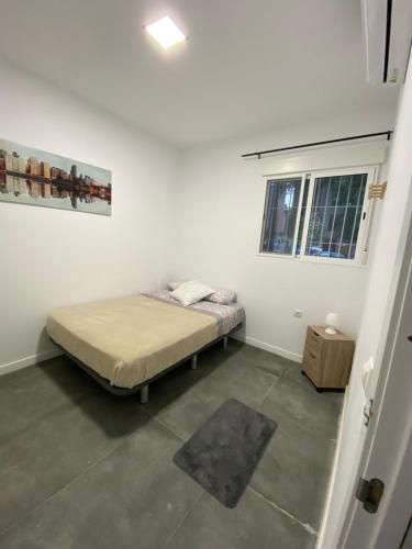 Postel nebo postele na pokoji v ubytování Valencia Ayora
