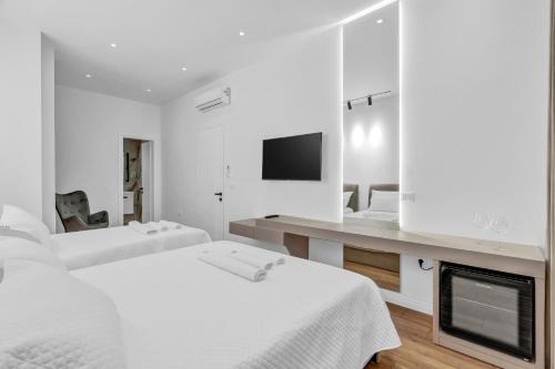 Postel nebo postele na pokoji v ubytování Apartment AD Berat