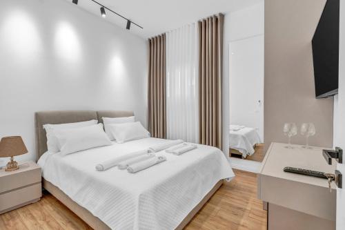 Postel nebo postele na pokoji v ubytování Apartment AD Berat