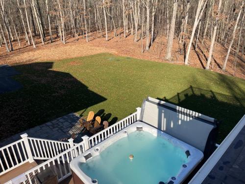 an overhead view of a hot tub on a backyard at Four Seasons For Fun Bed & Breakfast in Lakeville
