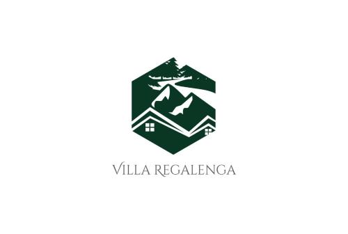 a shield with mountains and a house logo at Casa da Escola By Villa Regalenga in Talhada
