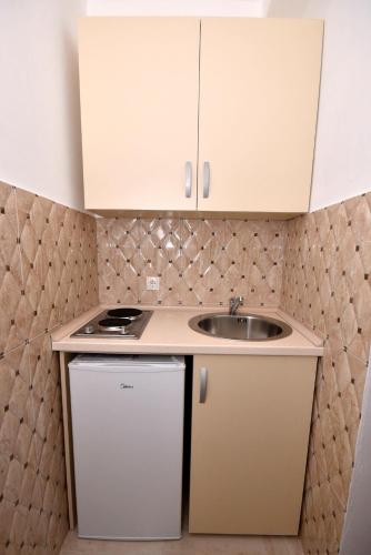 Dapur atau dapur kecil di Apartments Vukmarković